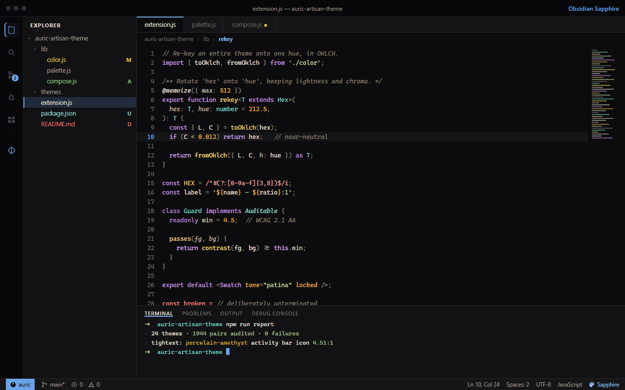 VS Code in the Auric Artisan Obsidian Sapphire theme, with blue accents on a warm charcoal canvas